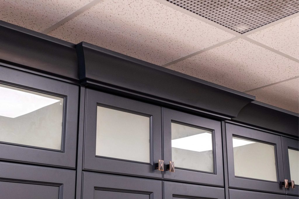 Custom cabinets with pull-out storage solutions in a Moncton kitchen renovation